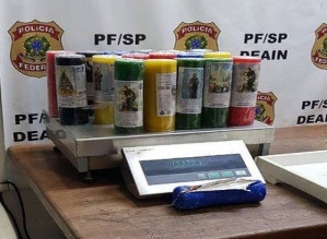 Mulher é presa com 9 kg de cocaína dentro de velas religiosas no aeroporto de Guarulhos